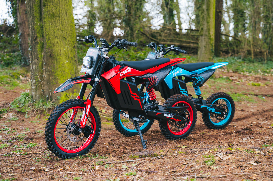 Child learning to ride a Kubbi electric dirt bike outdoors