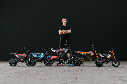 Young rider on a Kubbi electric dirt bike on private off-road land in the UK