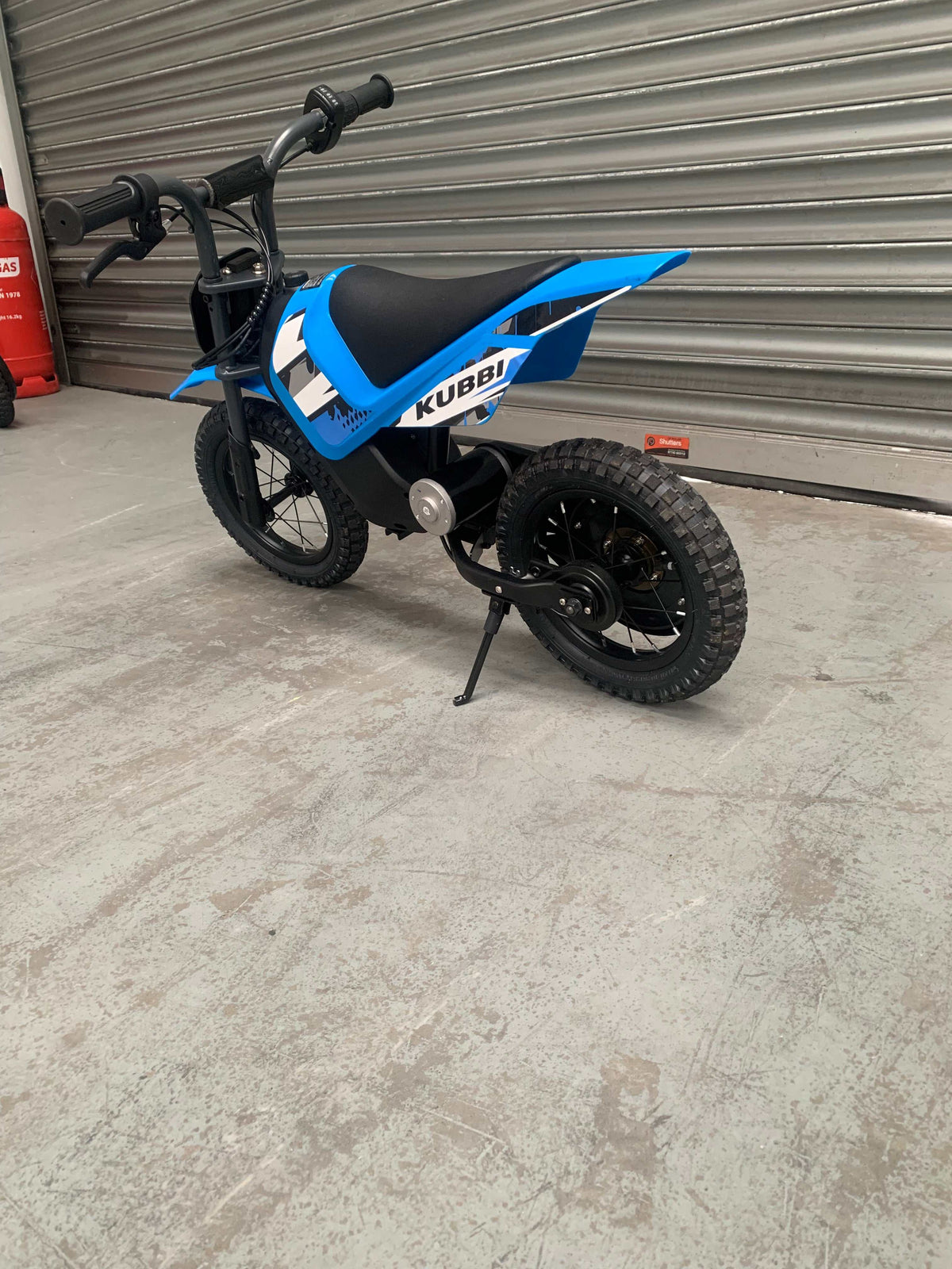 Kubbi Mini Electric Dirt Bike in blue, excellent condition, ridden once, warehouse deal