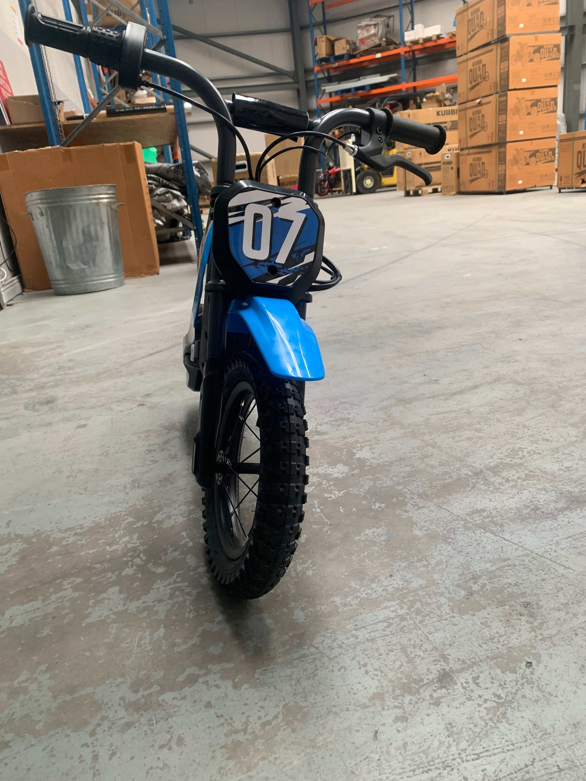 Blue Kubbi Mini Electric Dirt Bike in excellent condition, ridden once and fully operational warehouse deal