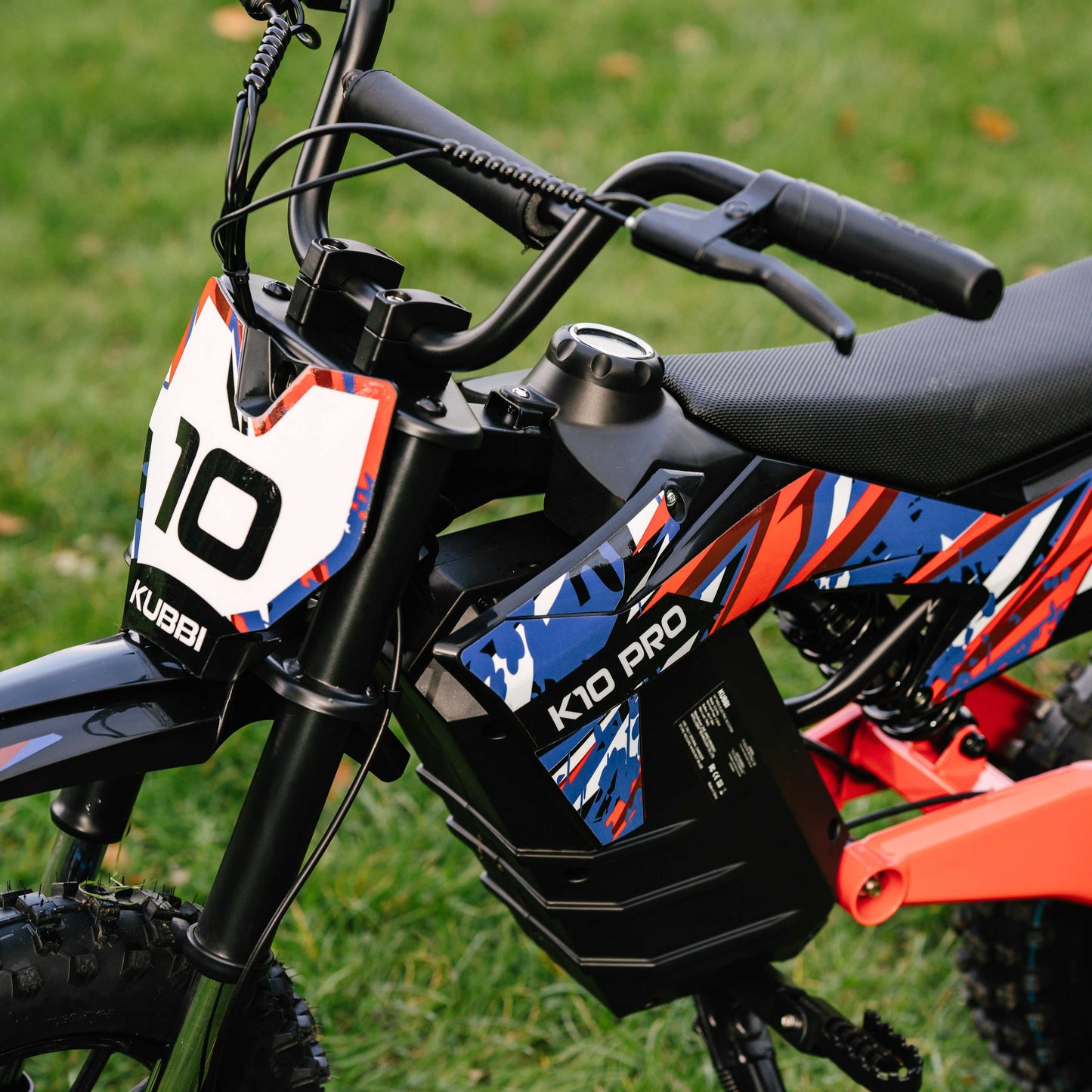Kubbi K10 Pro kids electric dirt bike with 14" tires and colorful design for off-road riding