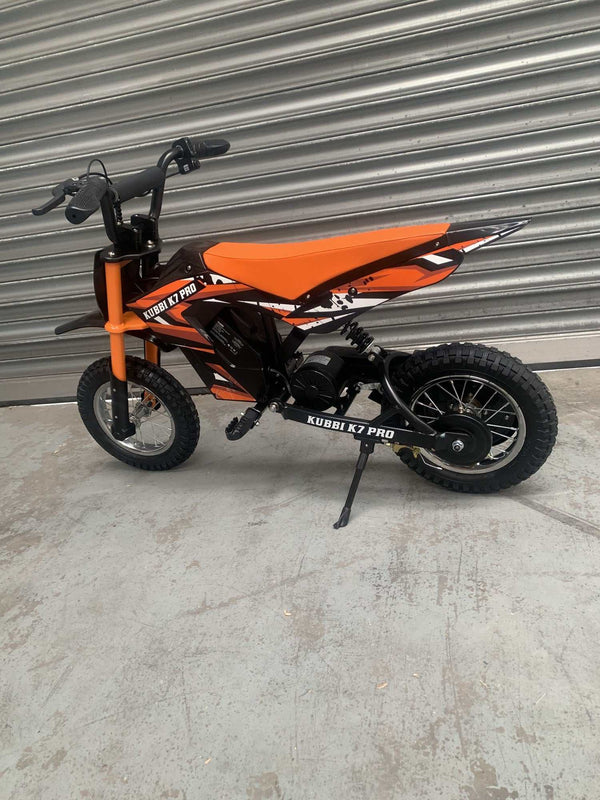 Kubbi K7 Pro orange electric dirt bike in new condition for kids warehouse deal